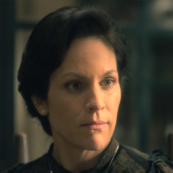 Annabeth Gish as Mrs. Dudley